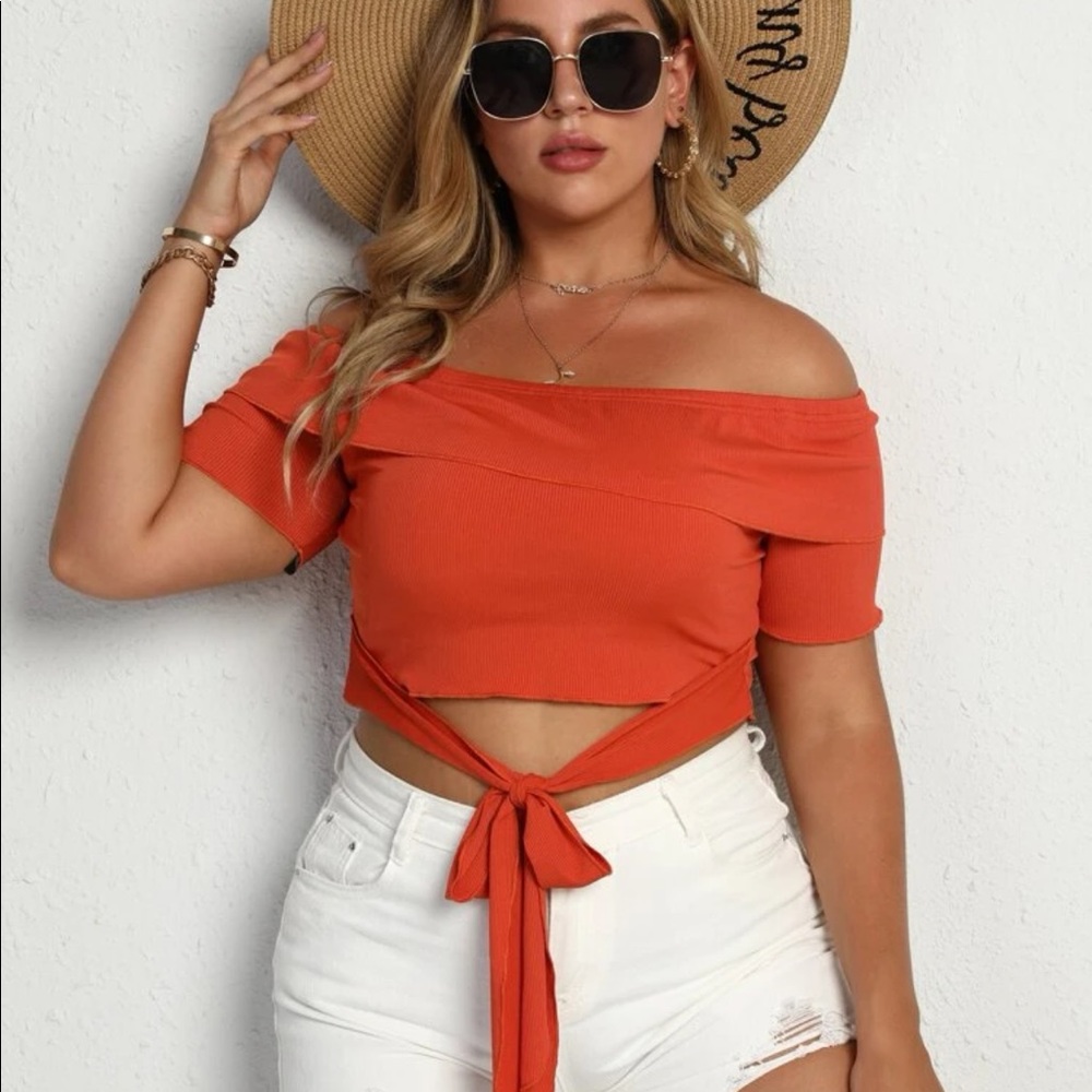 2/14$ NWOT Orange tie front cutout ruffle trim tee NEVER WORN